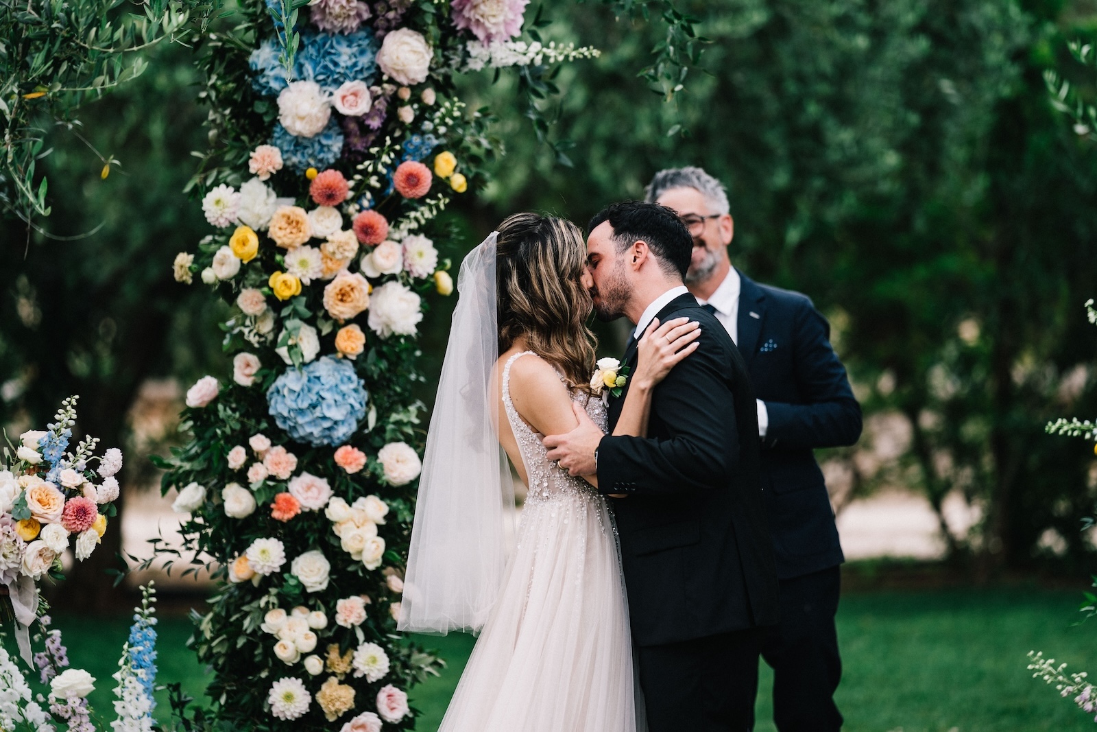 Puglia destination wedding first kiss